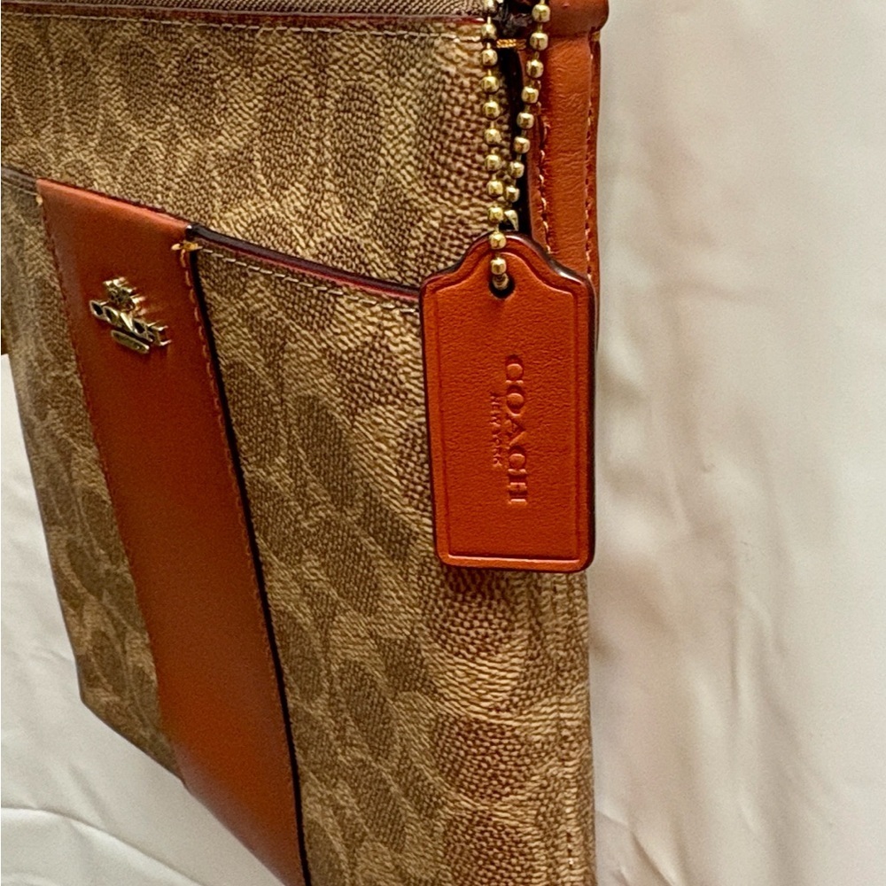Coach Kitt Messenger
Crossbody In Tan and Rust - Picture 12 of 14